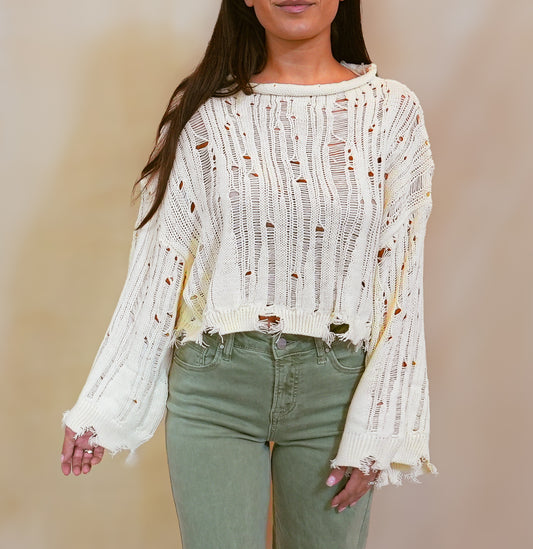 Distressed bell sleeve top